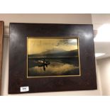 A Japanese print on panel depicting a mountainous landscape in a lacquered frame,