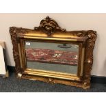 An antique gilt framed mirror,