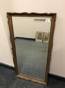 A gilt framed bevelled mirror,