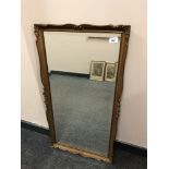 A gilt framed bevelled mirror,