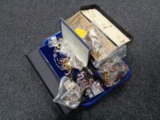 A tray containing assorted costume jewellery to include cameo brooches, beaded necklaces,