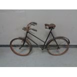 A vintage child's bicycle with sprung Wright seat