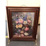 A reproduction fire screen with decorative still life panel