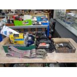Two boxes containing a quantity of power tools to include a half inch power drill, heat gun,