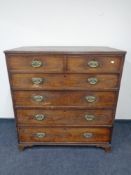 A Georgian mahogany six drawer chest with brass drop handles