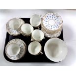 A tray of thirty-piece hand painted antique bone china tea service