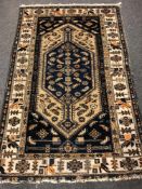 An antique Malayer rug 193 cm x 122 cm