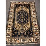 An antique Malayer rug 193 cm x 122 cm