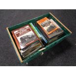 A crate of hard back and paper back books relating to railways