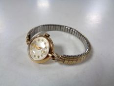 A lady's 9ct gold Audax wristwatch on plated bracelet strap