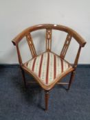 A late 19th century inlaid mahogany corner chair