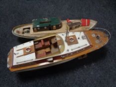 Two hand built remote controlled boats to include a pleasure craft