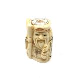 A carved Chinese bone netsuke - Village elder with staff