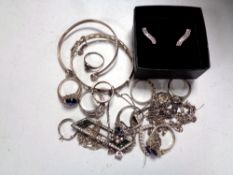 A collection of silver jewellery : brooches, rings, bangles, earrings,