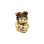 A carved Chinese bone netsuke - Lady with hair bow