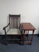 An Edwardian oak armchair and an occasional table