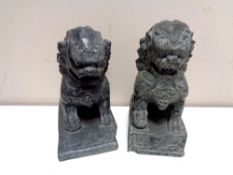 A pair of polished stone Chinese foo dogs