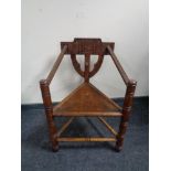 A late 19th century Turner's chair with Jacobean style carvings