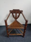 A late 19th century Turner's chair with Jacobean style carvings