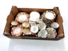 A box containing a quantity of antique and later tea china to include Phoenix ware and Wedgwood