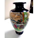 A 20th century Japanese vase depicting geishas