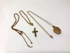 9ct gold jewellery comprising a locket on chain, a crucifix,