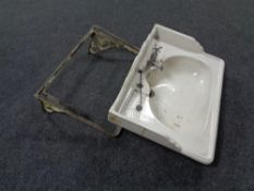 An early 20th century Abercorn ceramic sink together with cast iron wall mounting bracket