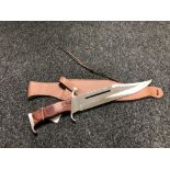 A 'Rambo III' hunting knife in sheath