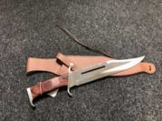 A 'Rambo III' hunting knife in sheath