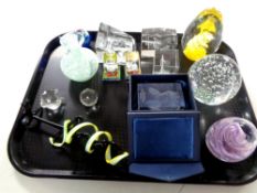 A tray containing assorted glassware to include paperweights, Caithness glass vase,