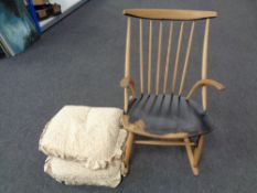 An Ercol elm and beech spindle back rocking chair
