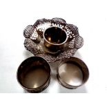 A Sheffield silver pierced rimmed dish together with three silver napkin rings