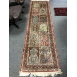 A silk-piled Indian runner of Persian Ghom design,