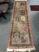 A silk-piled Indian runner of Persian Ghom design,