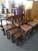 A set of four mahogany Queen Anne dining chairs together with a nest of three tables.