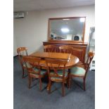 A nine piece Barker and Stonehouse dining room suite comprising of triple door sideboard fitted