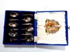 A set of six silver teaspoons in case to commemorate the silver jubilee of King George V