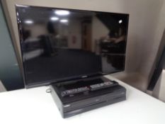 A Samsung 32'' LCD TV with remote together with a Toshiba DVD/ Video cassette recorder with remote