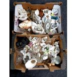 Two boxes containing a large quantity of swan ornaments to include ceramic,