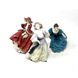 Thre Royal Doulton figurines Top o' the Hill HN1834, Rhapsody HN2267 and Grand Manner HN2723.