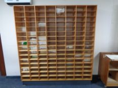 A 20th century haberdashers multi compartment shelving unit