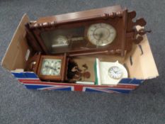 A box containing a J Schrenk wall clock together with a further 31 day wall clock and a cream ware