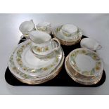 A tray containing 33 pieces of Duchess Green Sleeves tea and dinner china