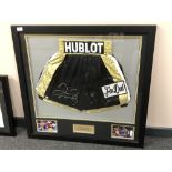A sporting memorabilia montage : A signed pair of boxing shorts, Floyd Mayweather Jr.