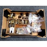 A box containing antique door and cabinet furniture to include wooden and brass handles, door locks,