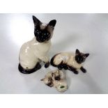 Three Beswick Siamese cat figures, No.