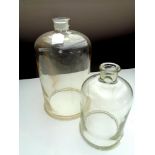 Two glass bell jars