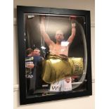 A sporting memorabilia montage : A signed gold VIP boxing glove, Billy Joe Saunders,