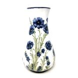 A William Moorcroft Macintyre Florian Ware Poppy Pattern vase, signed to base, height 31cm.