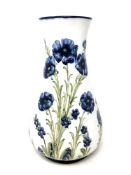 A William Moorcroft Macintyre Florian Ware Poppy Pattern vase, signed to base, height 31cm.